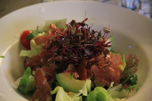 a salad in a white bowl on a table at Annandale Arms Hotel in Moffat