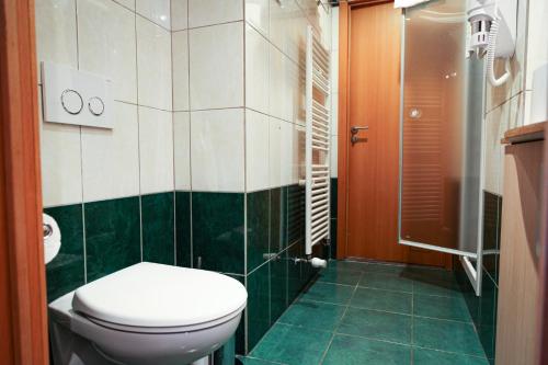 Vannituba majutusasutuses Wellness Apart Hotel