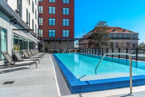 a swimming pool on the roof of a building at Hyatt Place Gainesville Downtown in Gainesville