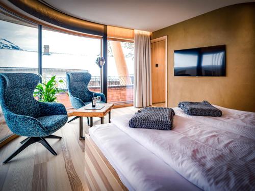 Un ou plusieurs lits dans un hébergement de l'établissement HAUSEREI Design & Kräuterhotel