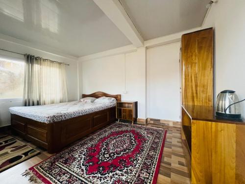 Cama o camas de una habitación en The Tranquil Farm Stay