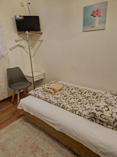 Ένα ή περισσότερα κρεβάτια σε δωμάτιο στο Zajazd Leśny