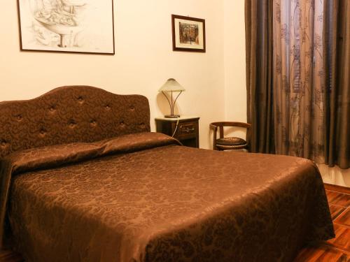 Кровать или кровати в номере Casa Vacanze Scalone