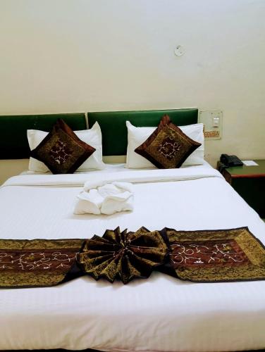 Hotel Ranjit Residencyにあるベッド