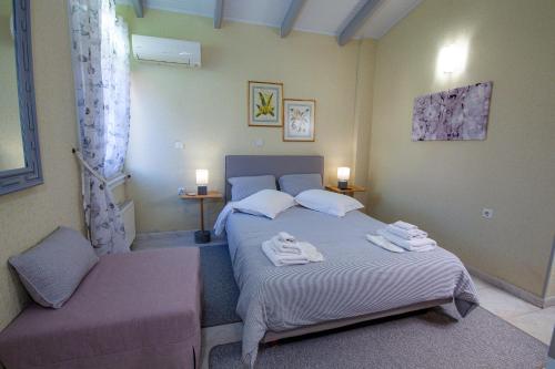 Natalie Apartmentsにあるベッド