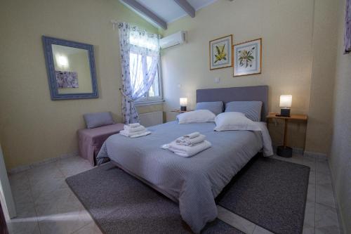 Natalie Apartmentsにあるベッド