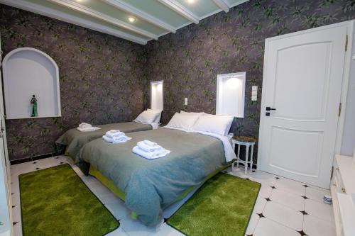 Natalie Apartmentsにあるベッド