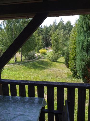 a view of a yard from a balcony at Agroturystyka Lisa Młyn in Najmowo
