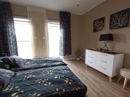 Postel nebo postele na pokoji v ubytování Apartament przy Kopalni Srebra