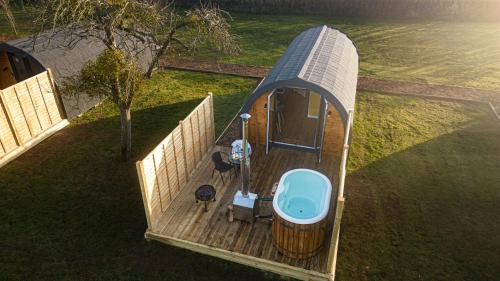an overhead view of a gazebo in the grass at Bramley, Apple Tree Glamping, Nr Wells in Wells