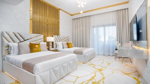 a hotel room with two beds and a television at Exclusive Retreat GLOBALSTAY's New 3BR Townhouse with Private Pool in Dubai
