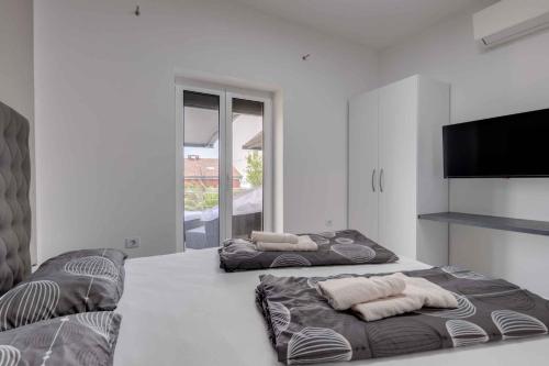 Posteľ alebo postele v izbe v ubytovaní Crikvenica Apartment 18