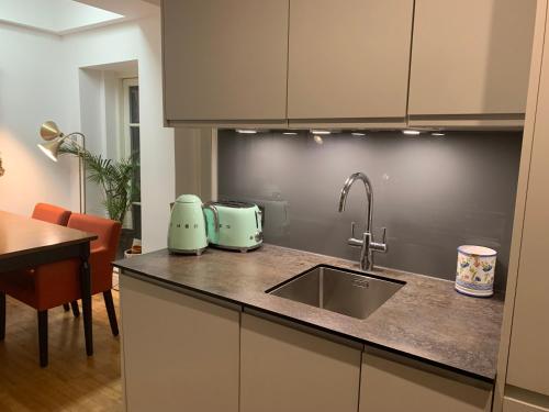 Kuchyň nebo kuchyňský kout v ubytování Apartment in Notting Hill