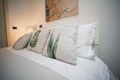 Tempat tidur dalam kamar di Corte Lotti Charming Loft