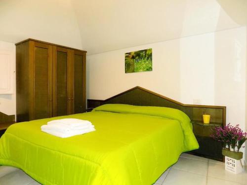 Кровать или кровати в номере L'orchidea amalfi coast