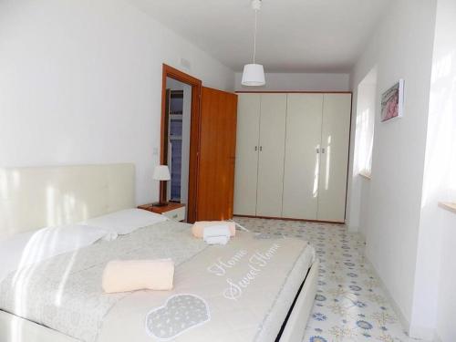 Кровать или кровати в номере L'orchidea amalfi coast