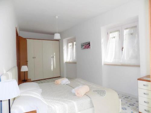Кровать или кровати в номере L'orchidea amalfi coast