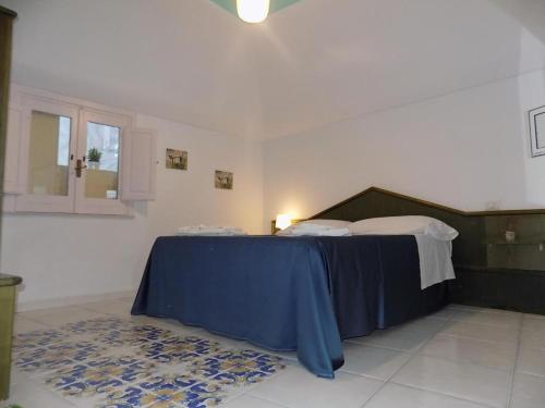 Кровать или кровати в номере L'orchidea amalfi coast