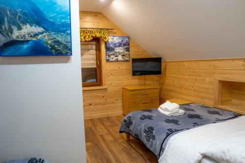 Postel nebo postele na pokoji v ubytování Apartamenty Aleksandra