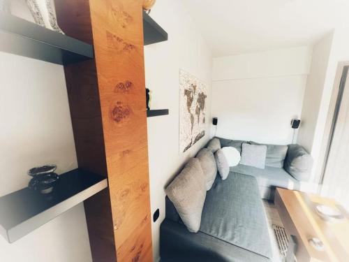a small room with a couch and a table at The Beehive in Mytilini