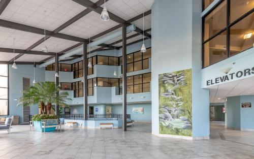 a rendering of the lobby of the elkmont building at Two-Bedroom Apartment in Orange Beach