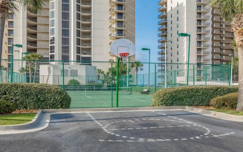 an empty basketball court with a basketball hoop at Standard Apartment in Orange Beach