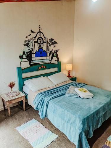Ένα ή περισσότερα κρεβάτια σε δωμάτιο στο Hostel Tiradentes