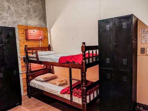 Ένα ή περισσότερα κρεβάτια σε δωμάτιο στο Hostel Tiradentes