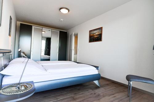 Postel nebo postele na pokoji v ubytování Haus Nordseebrandung NC54