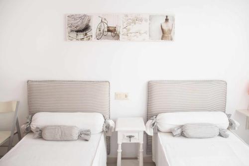 Postel nebo postele na pokoji v ubytování Les Pites I 2n 2a Bonito apartamento con terraza