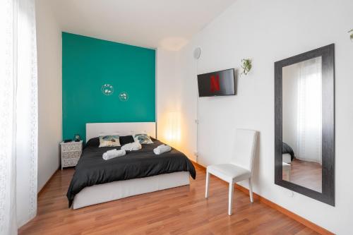 Postel nebo postele na pokoji v ubytování San Siro Big House Wifi Netflix Free Parking