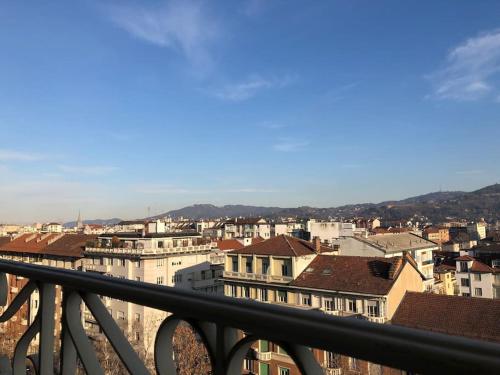 a view of a city from a balcony at Alloggio Galileo in Turin