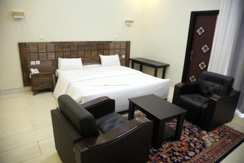 Postel nebo postele na pokoji v ubytování Easternhillshotel ltd