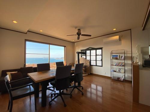 a dining room with a table and chairs at H&H - Vacation STAY 14242 in Kitakyushu