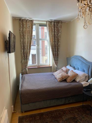 Postel nebo postele na pokoji v ubytování Apartament nad Wysła