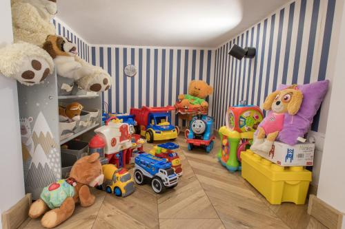 a childs room with many toys in it at Apartament Chopina 5 m5 - Centrum Sopotu 3 min do Monciaka in Sopot