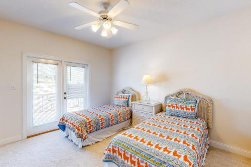 En eller flere senge i et værelse på Dunes East