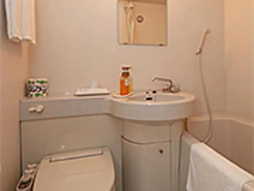 a small bathroom with a sink and a toilet at Cosmo Inn - Vacation STAY 42013v in Fukuroi