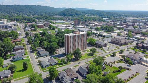 an aerial view of a city with a tall building at Beautiful renovated Studio Apartment in Gadsden AL in Gadsden