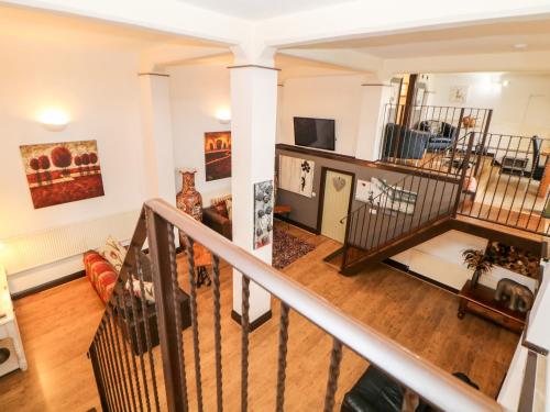 a view of a living room from the second floor of a house at Cambridge Lodge in Matlock