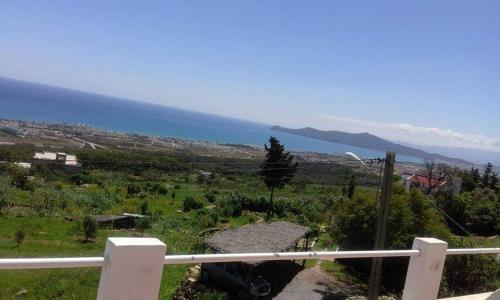 a view of the ocean from a hill at Casa Amanecer Zemzem / Marina Smir in Marina Smir