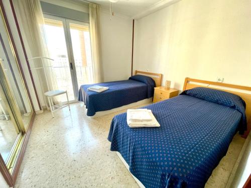 Posteľ alebo postele v izbe v ubytovaní Apartamento Ocean 2 by Gestaltur