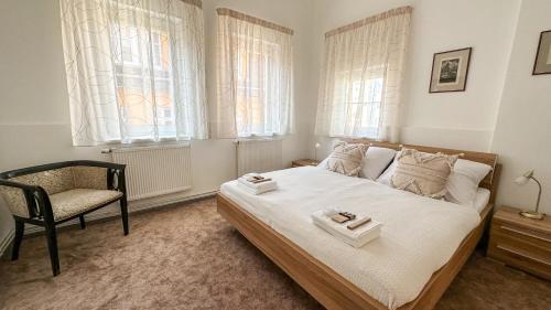 Een bed of bedden in een kamer bij Apartment Bohemia