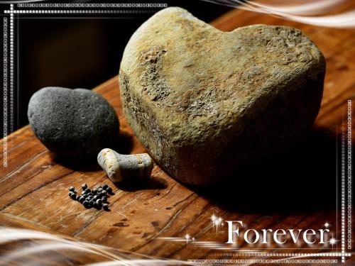 a picture of a heart and a rock and a hammer at 心享庭園民宿 Wishes B&B in Jian