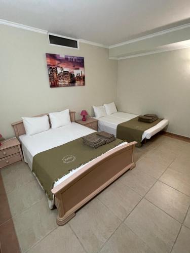 Postel nebo postele na pokoji v ubytování Casa Oliveiras