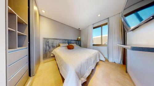 Postel nebo postele na pokoji v ubytování Liniers Green Apartments