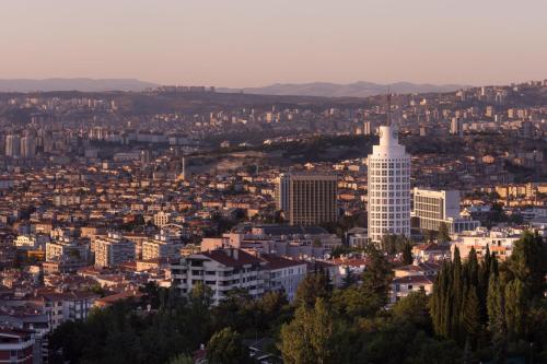 a city skyline with a tall white building at Sheraton Ankara Hotel & Convention Center in Ankara