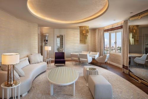 a living room with a couch and a table at Sheraton Ankara Hotel & Convention Center in Ankara