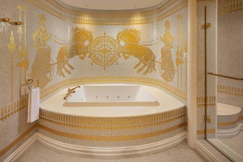 a bathroom with a bath tub in a room at Sheraton Ankara Hotel & Convention Center in Ankara