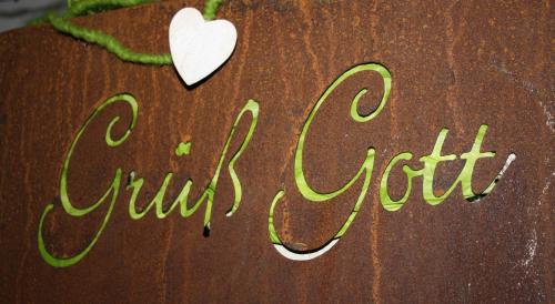 a sign that says cut off with a heart on it at Apartments HAUS SCHÖN - Preise inclusive Pitztal Sommer Card in Jerzens